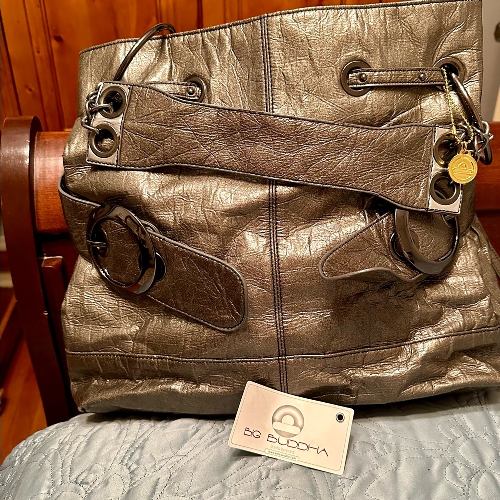 Big Buddha Silver Shoulder bag bought at a boutique.